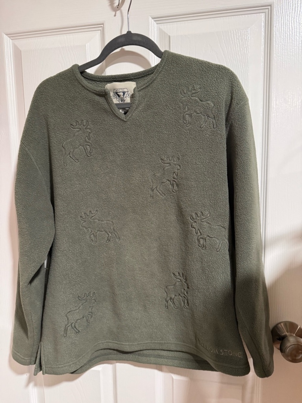 Olive Green women’s Fleece long  sleeve top with Moose Emboss. Yellowstone